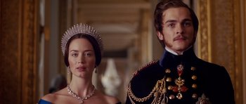 Movie still from “The Young Victoria” (2009), directed by Jean-Marc Vallée – A man and a woman standing next to each other; Close Up shot, Low angle