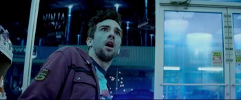 Movie still from “This Is the End” (2013), directed by Seth Rogen – A man with a beard is looking up at the sky; Close Up shot, Low angle