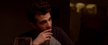 Movie still from “This Is the End” (2013), directed by Seth Rogen – A man with a beard is sitting in a room with his hand on his chin; Close Up shot, Over the shoulder angle