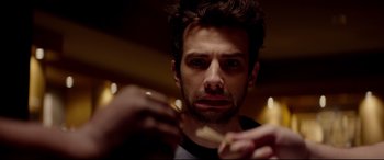 Movie still from “This Is the End” (2013), directed by Seth Rogen – A person holding a tooth brush; Close Up shot, Over the shoulder angle