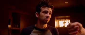 Movie still from “This Is the End” (2013), directed by Seth Rogen – A person wearing a black shirt; Close Up shot, Over the shoulder angle