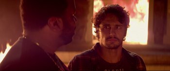 Movie still from “This Is the End” (2013), directed by Seth Rogen – Two men are talking in a room; Close Up shot, Over the shoulder angle