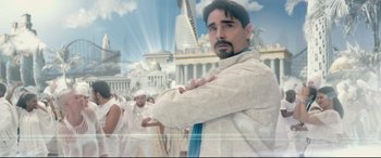 Movie still from “This Is the End” (2013), directed by Seth Rogen – A man standing in front of a group of people; Medium shot, Low angle