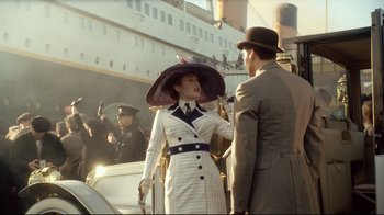 Movie still from “Titanic” (1997), directed by James Cameron – A man and a woman standing next to each other on a boat; Medium shot, Over the shoulder angle