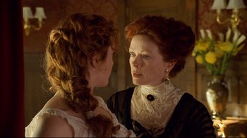 Movie still from “Titanic” (1997), directed by James Cameron – A woman and a young girl looking at each other; Close Up shot, Over the shoulder angle