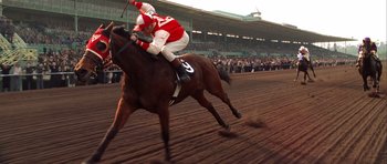 Movie still from “Seabiscuit” (2003), directed by Gary Ross – Medium shot, Low angle