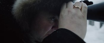 Movie still from “To the Lake” (2019), directed by Pavel Kostomarov – A man holding his hand to his head; Extreme Close Up shot, Over the shoulder angle