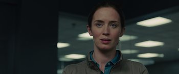Movie still from “Sicario” (2015), directed by Denis Villeneuve – A person wearing a jacket; Close Up shot, Over the shoulder angle
