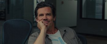 Movie still from “Sicario” (2015), directed by Denis Villeneuve – A person with his hand under his chin; Close Up shot, Over the shoulder angle