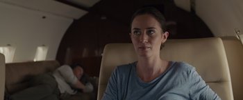 Movie still from “Sicario” (2015), directed by Denis Villeneuve – A woman sitting in a chair in front of a man; Close Up shot, Over the shoulder angle
