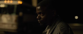 Movie still from “Sicario” (2015), directed by Denis Villeneuve – A person looking at the camera; Close Up shot, Over the shoulder angle