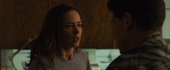 Movie still from “Sicario” (2015), directed by Denis Villeneuve – A woman and a man are talking in a room; Close Up shot, Over the shoulder angle