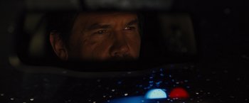 Movie still from “Sicario” (2015), directed by Denis Villeneuve – A person looking at a computer screen; Close Up shot, Over the shoulder angle