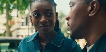 Movie still from “Top Boy” (2011), created by Ronan Bennett – A young man and a young woman looking into each others eyes; Close Up shot, Over the shoulder angle