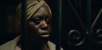 Movie still from “Top Boy” (2011), created by Ronan Bennett – A person wearing a turban; Close Up shot, Low angle