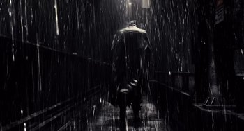 Movie still from “Sin City” (2005), directed by Frank Miller – A man walking down a rain covered staircase; Wide shot, Low angle
