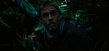 Movie still from “Triple Frontier” (2019), directed by J.C. Chandor – A person with a beard; Close Up shot, Low angle