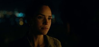 Movie still from “Triple Frontier” (2019), directed by J.C. Chandor – A person wearing a jacket; Close Up shot, Over the shoulder angle