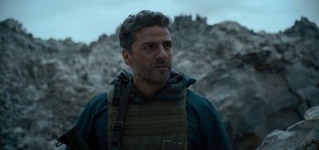 Movie still from “Triple Frontier” (2019), directed by J.C. Chandor – A person wearing a jacket; Close Up shot, Over the shoulder angle
