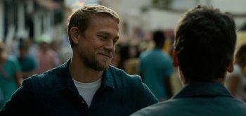 Movie still from “Triple Frontier” (2019), directed by J.C. Chandor – A person talking to another person; Close Up shot, Over the shoulder angle