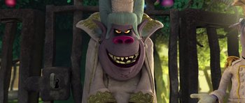 Movie still from “Trolls” (2016), directed by Mike Mitchell – A cartoon character with a big evil face; Close Up shot, Low angle
