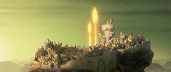 Movie still from “Trolls” (2016), directed by Mike Mitchell – An image of a group of people that are standing in a field; Extreme Wide shot, Low angle