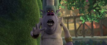 Movie still from “Trolls” (2016), directed by Mike Mitchell – An animated character with horns on his head; Medium shot, Over the shoulder angle