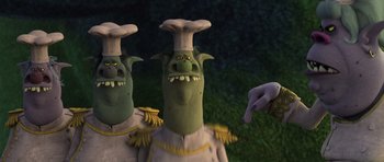 Movie still from “Trolls” (2016), directed by Mike Mitchell – A person pointing at two cartoon characters; Close Up shot, Low angle