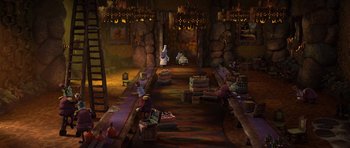 Movie still from “Trolls” (2016), directed by Mike Mitchell – An image of a room with a lot of stuff on the floor; Wide shot, High angle