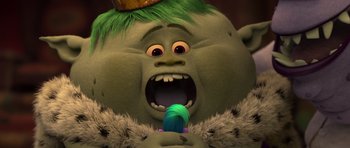 Movie still from “Trolls” (2016), directed by Mike Mitchell – A person with a green wig; Close Up shot, Low angle