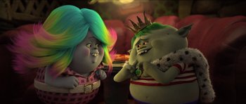 Movie still from “Trolls” (2016), directed by Mike Mitchell – A couple of cartoon characters sitting next to each other; Medium shot, Over the shoulder angle