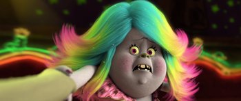 Movie still from “Trolls” (2016), directed by Mike Mitchell – A doll with a colorful wig; Close Up shot, High angle