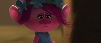 Movie still from “Trolls” (2016), directed by Mike Mitchell – A troll doll's face; Close Up shot, Over the shoulder angle