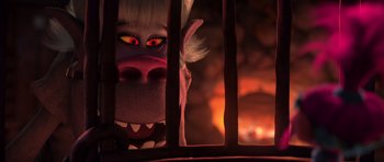 Movie still from “Trolls” (2016), directed by Mike Mitchell – A troll looking through a fence; Close Up shot, Over the shoulder angle