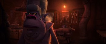 Movie still from “Trolls” (2016), directed by Mike Mitchell – A stuffed animal is sitting in a living room; Close Up shot, Low angle