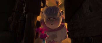 Movie still from “Trolls” (2016), directed by Mike Mitchell – A troll doll is in a room with a troll doll; Close Up shot, Over the shoulder angle