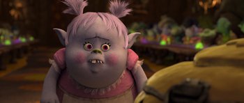 Movie still from “Trolls” (2016), directed by Mike Mitchell – An image of an animated character with pink hair; Close Up shot, Over the shoulder angle