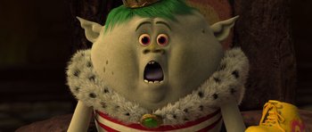 Movie still from “Trolls” (2016), directed by Mike Mitchell – The head of a cartoon character; Close Up shot, Low angle