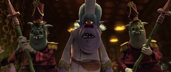 Movie still from “Trolls” (2016), directed by Mike Mitchell – A cartoon character with an evil look on his face; Medium shot, Low angle