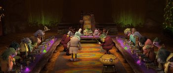 Movie still from “Trolls” (2016), directed by Mike Mitchell – A group of people standing in a room; Wide shot, High angle