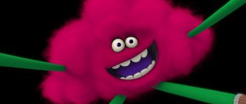 Movie still from “Trolls” (2016), directed by Mike Mitchell – A pink monster with a big smile on its face; Close Up shot, Low angle