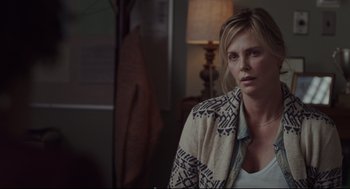 Movie still from “Tully” (2018), directed by Jason Reitman – Charlize theron in a scene from the movie a million ways to die in the west; Close Up shot, Over the shoulder angle