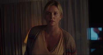 Movie still from “Tully” (2018), directed by Jason Reitman – Charlize theron in a scene from the movie a million ways to die in the west; Close Up shot, Over the shoulder angle