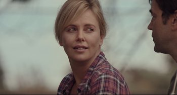 Movie still from “Tully” (2018), directed by Jason Reitman – A person wearing a plaid shirt; Close Up shot, Over the shoulder angle