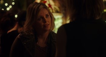 Movie still from “Tully” (2018), directed by Jason Reitman – A woman sitting at a table talking to another woman; Close Up shot, Over the shoulder angle