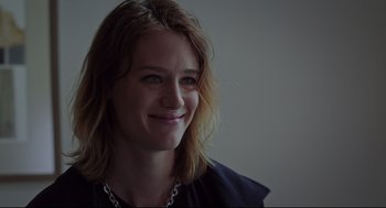 Movie still from “Tully” (2018), directed by Jason Reitman – A person wearing a necklace; Close Up shot, Over the shoulder angle