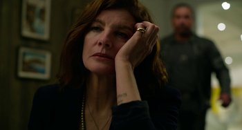 Movie still from “Velvet Buzzsaw” (2019), directed by Dan Gilroy – A person with her hand on her face; Close Up shot, High angle