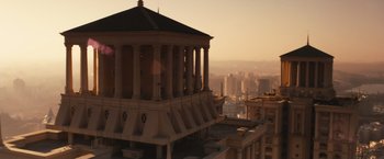 Movie still from “Slumdog Millionaire” (2008), directed by Danny Boyle – A large building with a tower on top of it; Extreme Wide shot, High angle