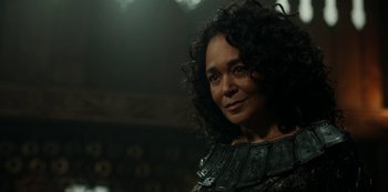 Movie still from “Vikings: Valhalla” (2022), created by Jeb Stuart – A person with curly black hair; Close Up shot, Over the shoulder angle