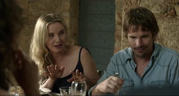 Movie still from “Before Midnight” (2013), directed by Richard Linklater – A woman and a man sitting at a table; Close Up shot, Over the shoulder angle